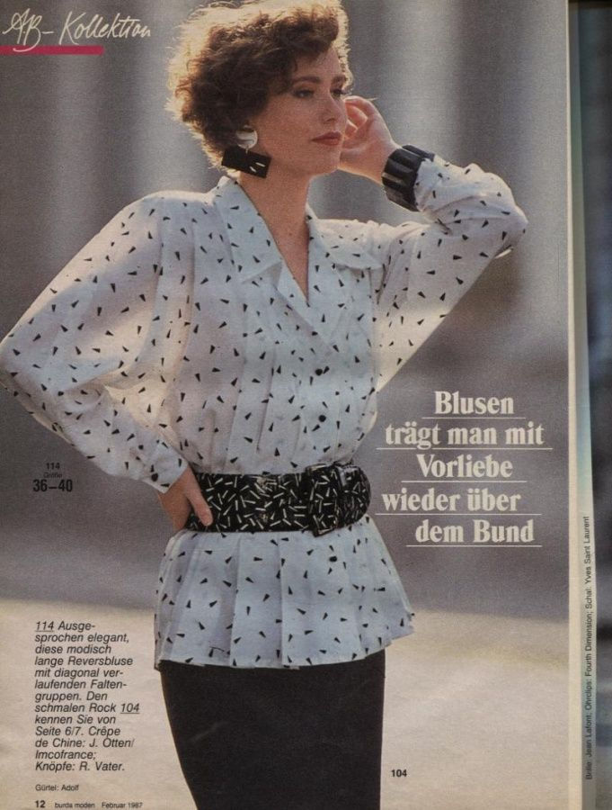 Vintage white dress with fitted waist and flared peplum detail