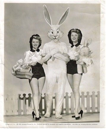Two vintage pin up girls with a giant easter bunny