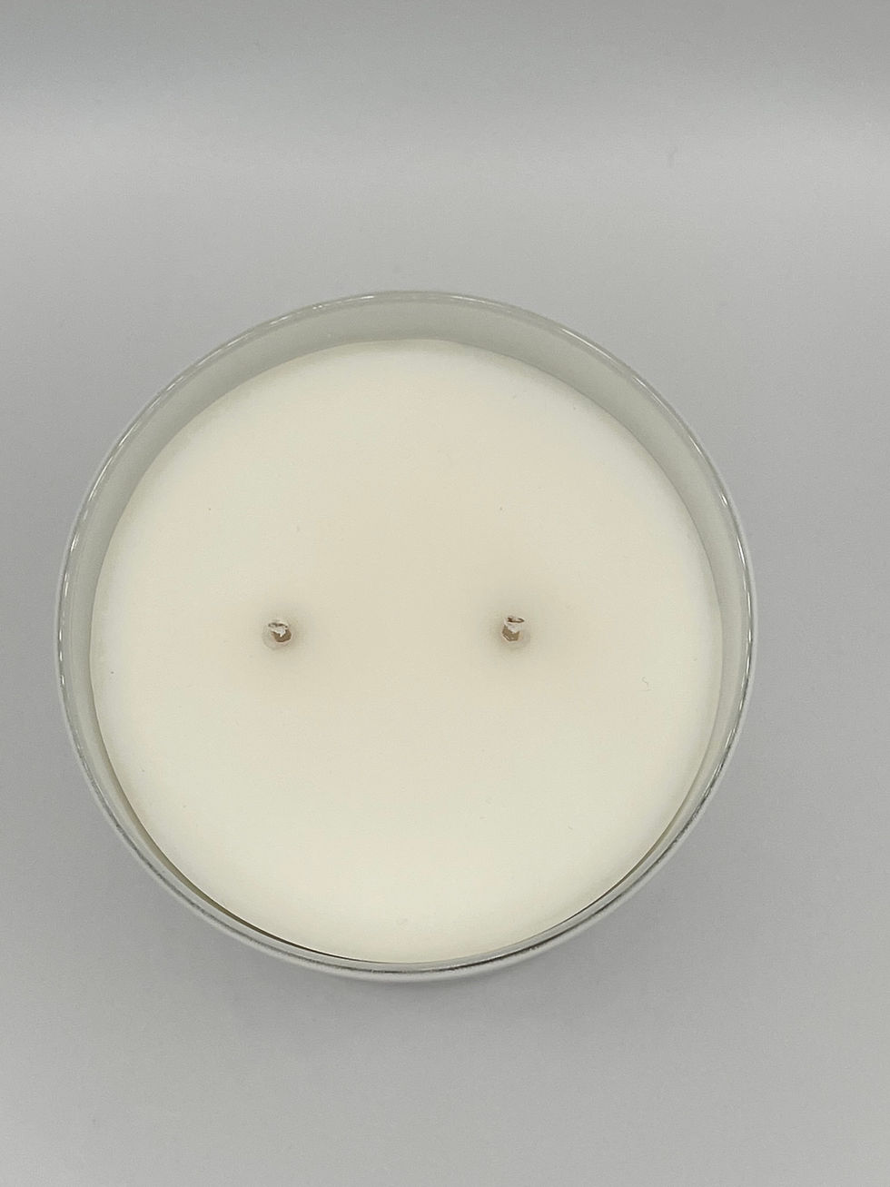 Thumbnail: Top of a candle with two wicks