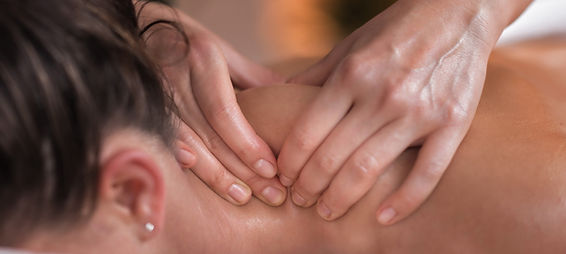 female receiving a neck massage