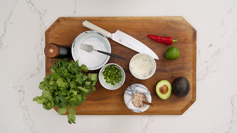 JF California Guac ingredients on a wooden cutting board