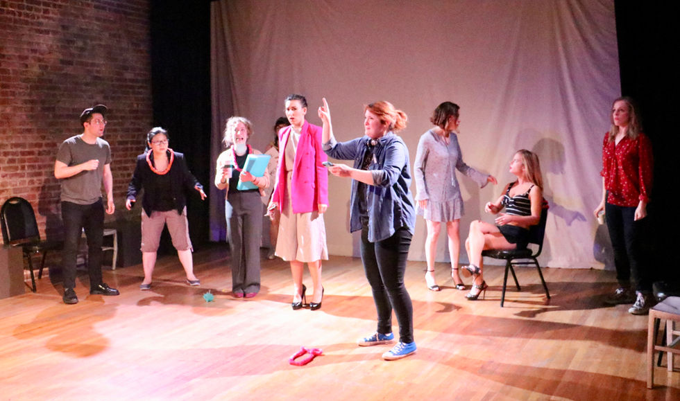 Mary Bess performs with the cast of HPV: Her Point of View Network at the Brooklyn Comedy Collective