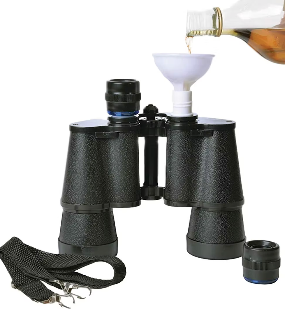 Hidden flask binoculars with a funnel being used to pour liquid inside.