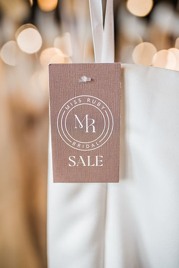 Sale tag on a wedding dress