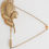 תמונה ממוזערת: Dolce & Gabbana Gold Tone Leaf 925 Sterling Silver Crystal Chain Brooch