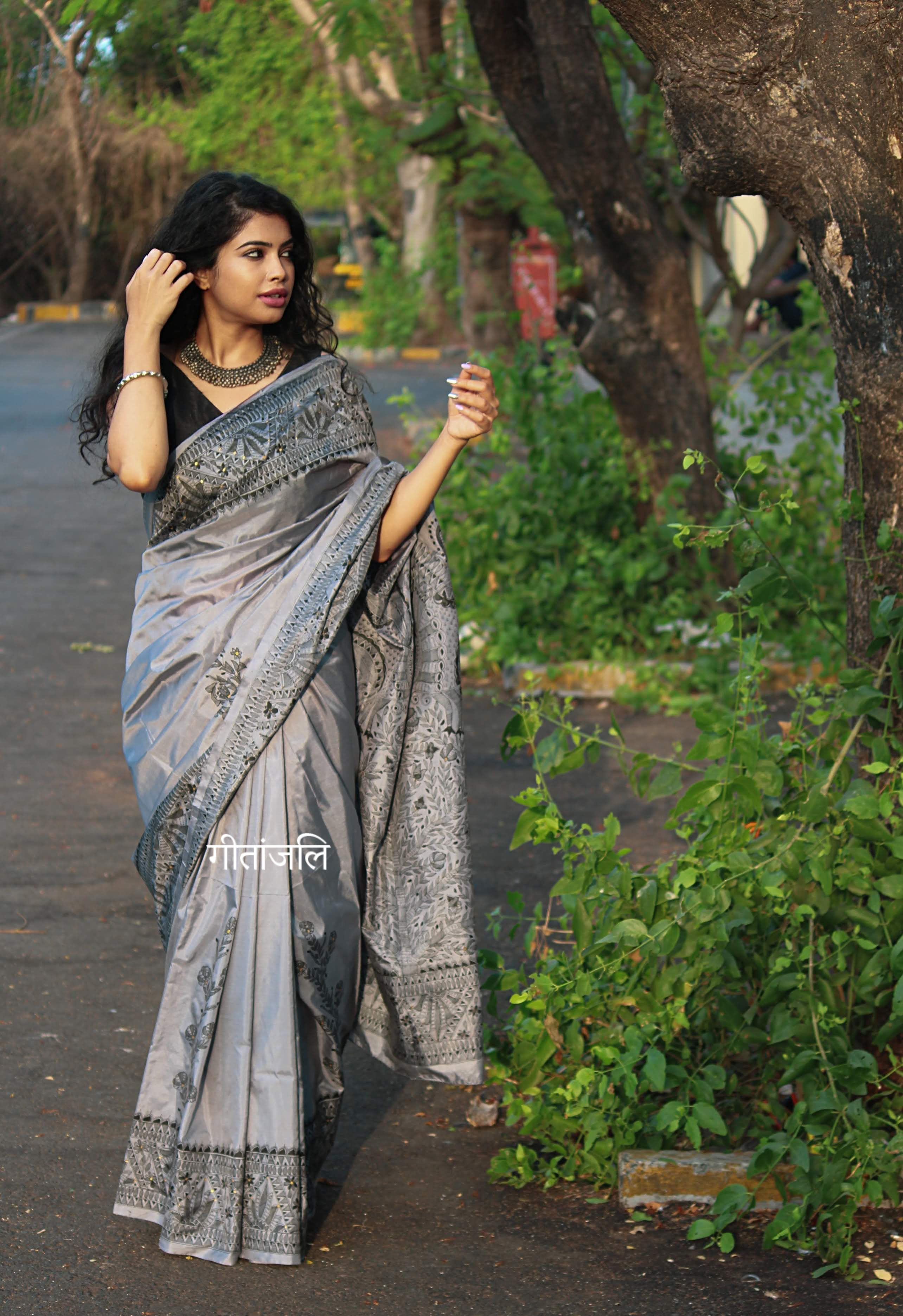Penaaz : Grey handpainted madhubani Bangalore silk saree with twin peacocks