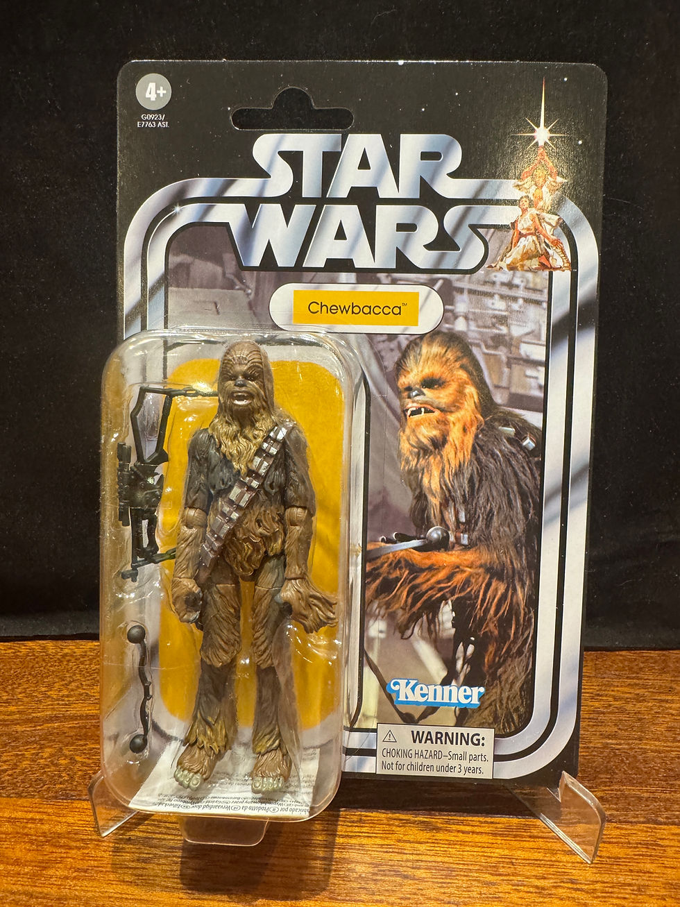 Star Wars Chewbacca action figure in packaging, RAWSTARWARS on cardboard background.