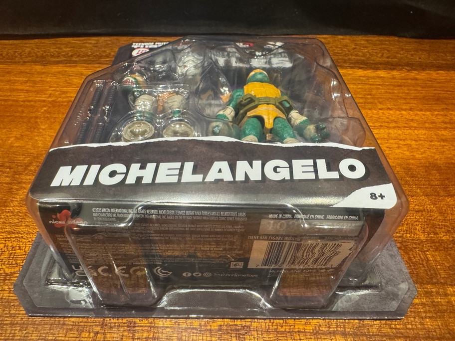 McFarlane Toys TMNT Teenage Mutant Ninja Turtles Page Punchers MICHELANGELO 5" Figure with Comic
