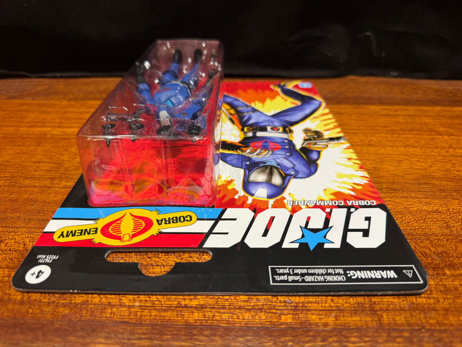 G.I. Joe Cobra Commander action figure in packaging. G.I. Joe logo visible