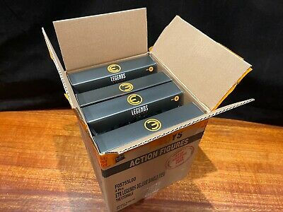 Four action figure boxes inside a shipping box