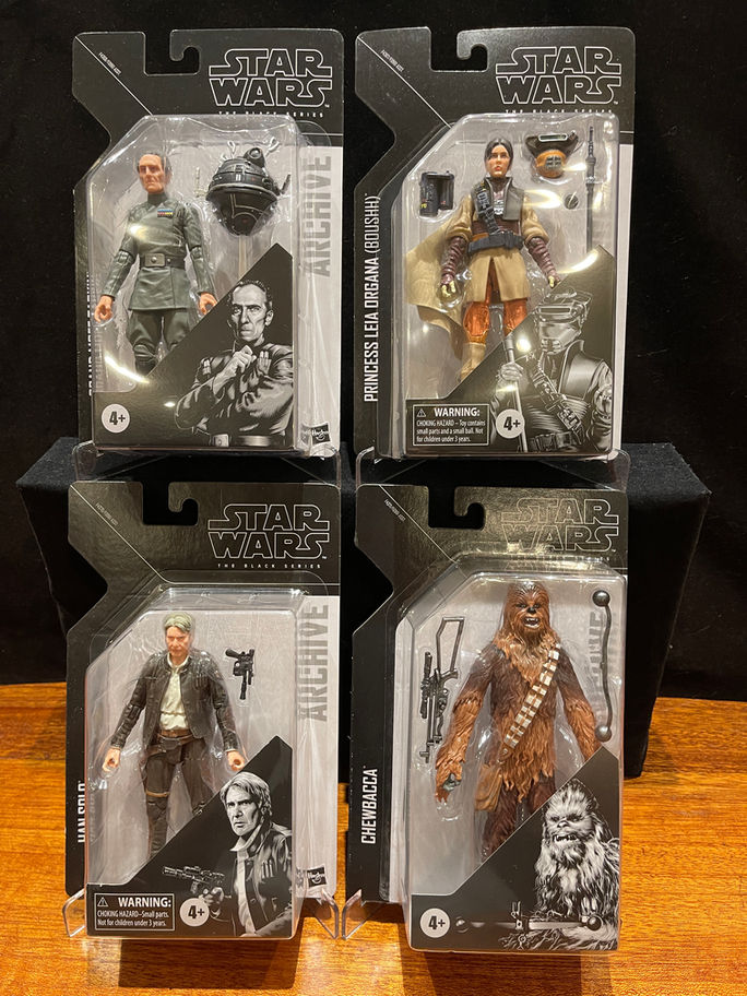 Four Star Wars Black Series action figures