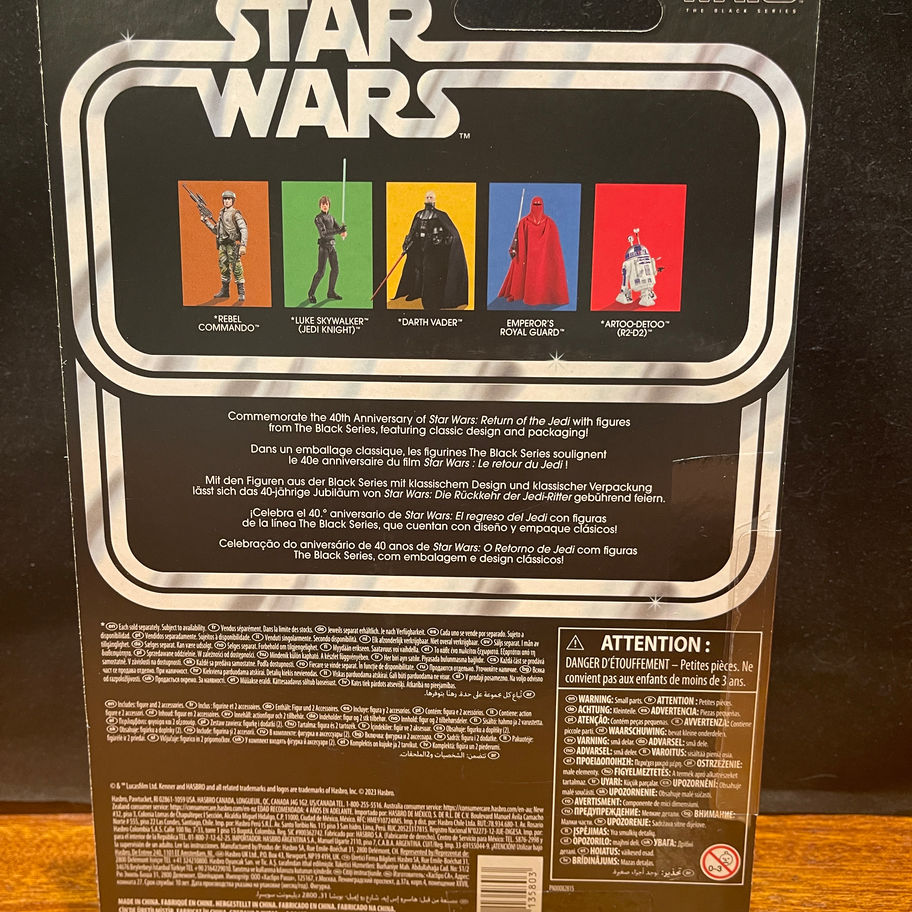 Star Wars card back: Leia, Darth Vader, and others