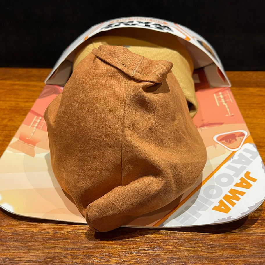 Brown hat in packaging