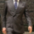 Charcoal double-breasted bespoke suit tailored for senior executives in the UAE