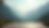 Wide angle view of a tranquil mountain landscape with a yoga platform overlooking the valley