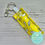 Thumbnail: Lip Balm Holder Keyring PLUS Lip Balm - Yellow Umbrellas