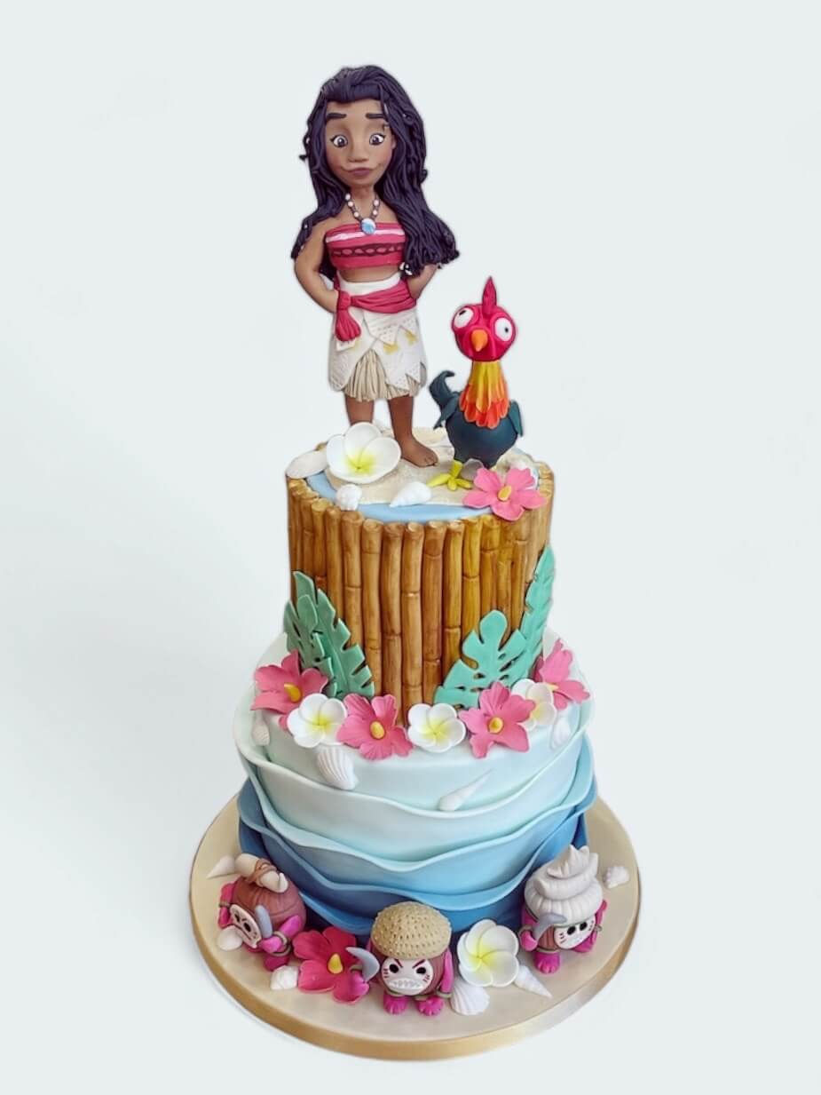 Cakes with tall models on top like this Moana themed cake are a good example of a cake where delivery is preferable for your peace of mind.