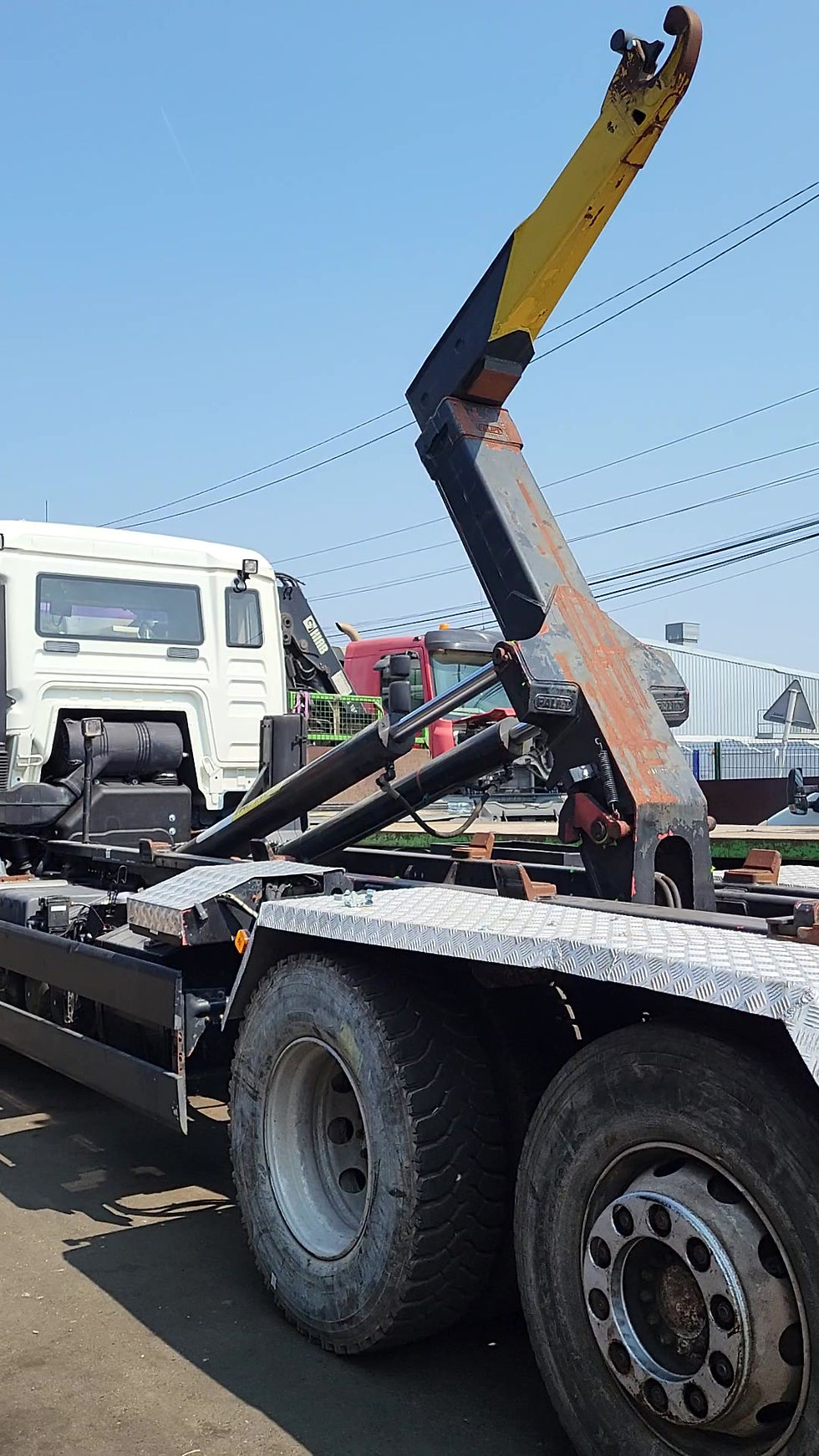 Miniature : Camion Polybenne M.A.N. avec bras de levage Guima