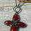 Thumbnail: Red Vintage Red Glass Quatrefoil Flower Necklace