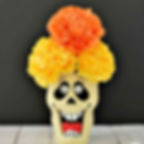 Curious about these Dia de los Muertos flowers? They're marigolds and an beautiful part of this tradition. Now your kids can make these flowers to use in celebratory decor.