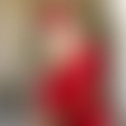 Blog icon image of grandson in cap and gown, hugging his grandmother at graduation, a milestone memory worth turning into a keepsake