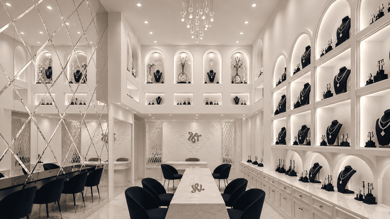 Luxury jewellery showroom interior with diamond-cut mirrored walls, illuminated arch display niches, marble display counters, custom cabinetry, and elegant seating designed for a premium retail experience.
