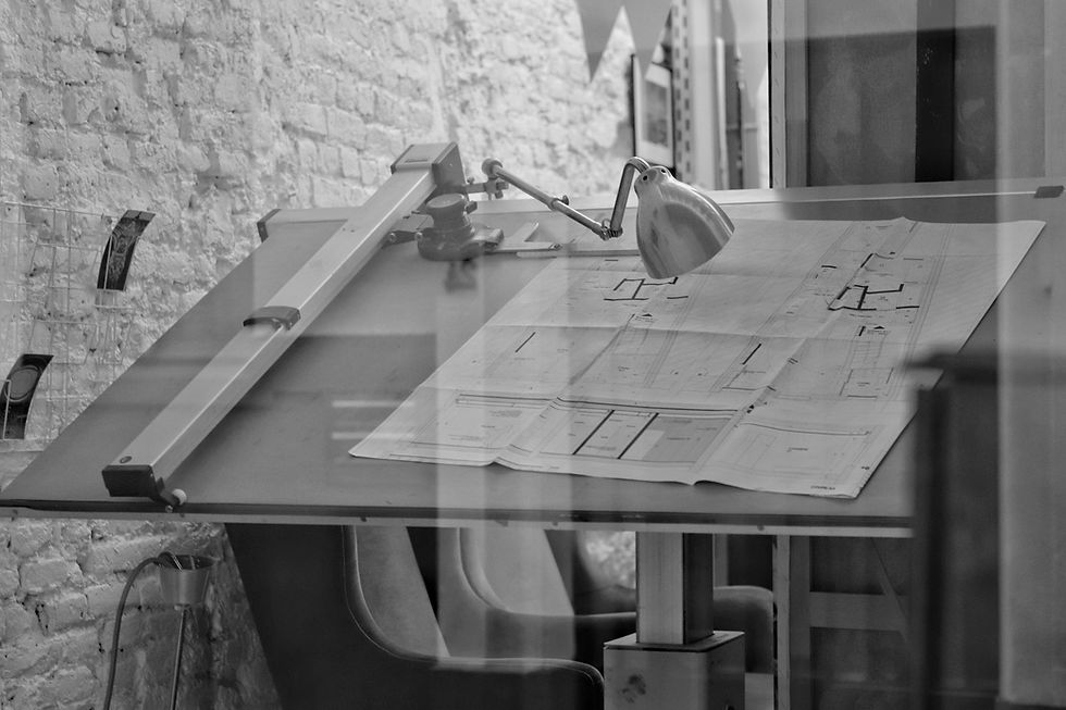 grayscale photo of chair and table_edited.jpg