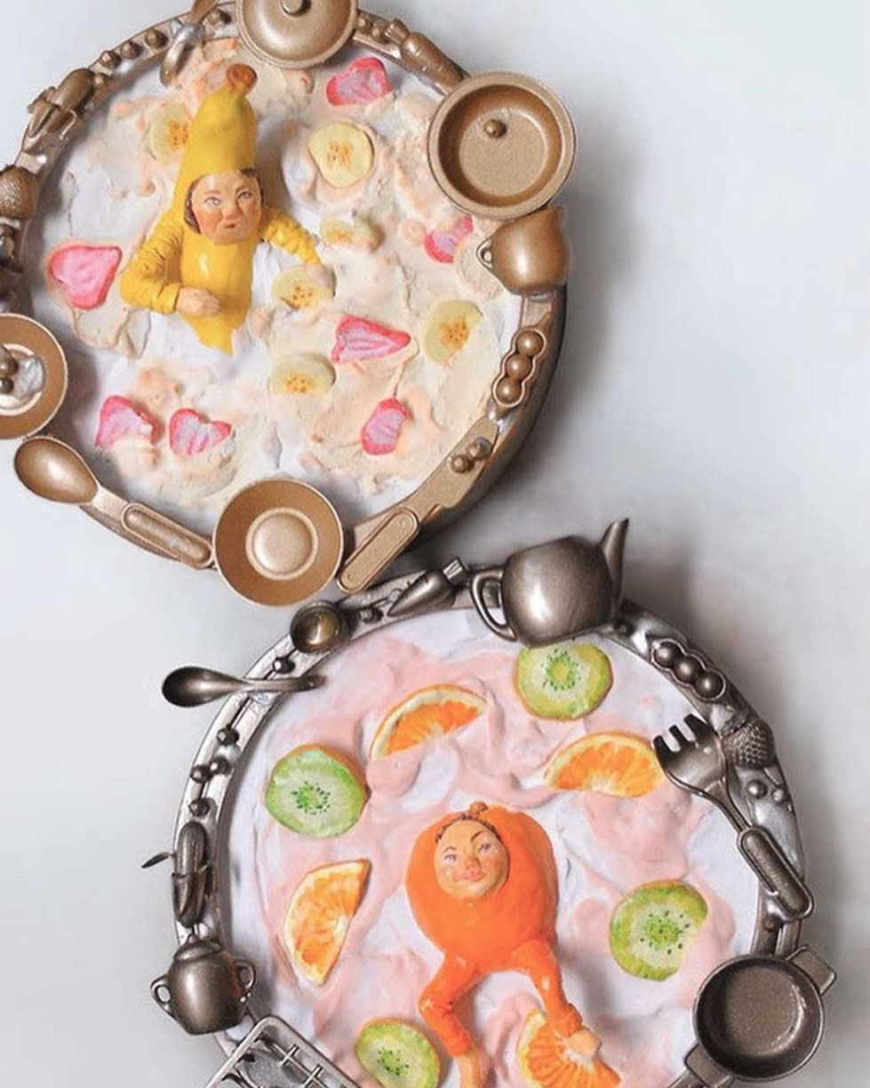 banana girl and orange boy swimming in dessert