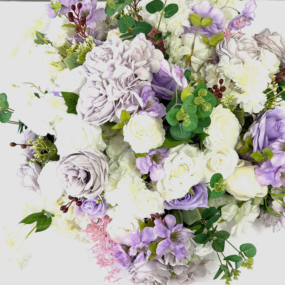 Lovely lavender and white artificial flower arrangement