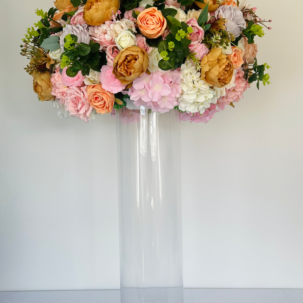 Vibrant floral arrangement on a clear vase, featuring Dusky Pink Roses and Admire's Furnishings.