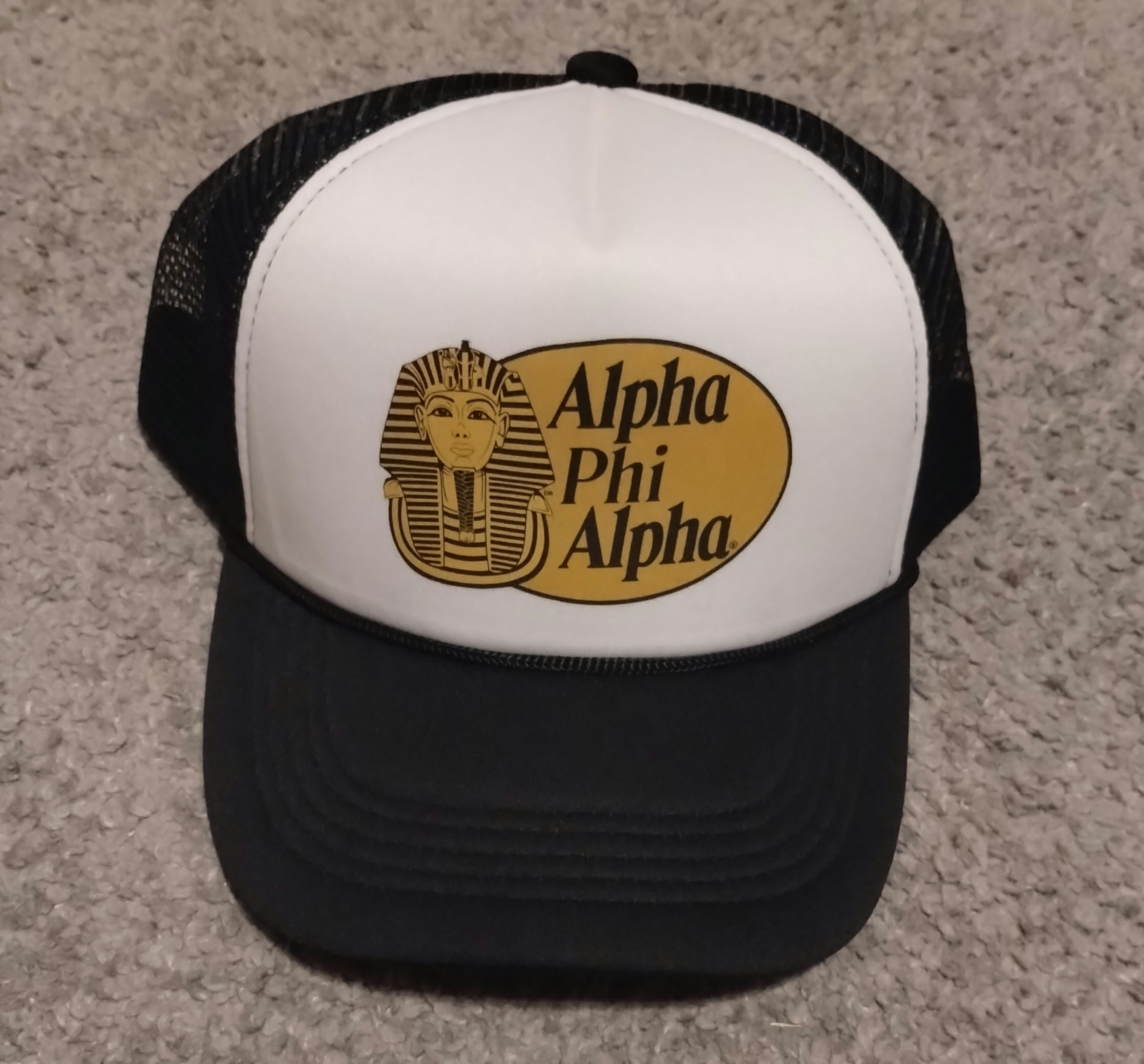 White and Black Alpha Phi Alpha Trucker