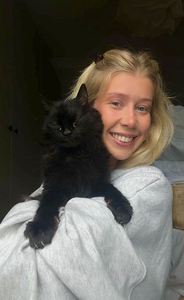 Woman staff from the cat sitting company