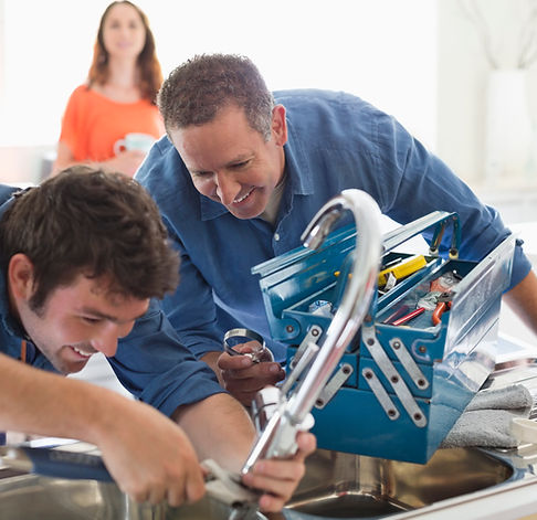 Plumbers Fixing Sink
