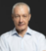 thoughtful-senior-man-light-blue-shirt.jpg