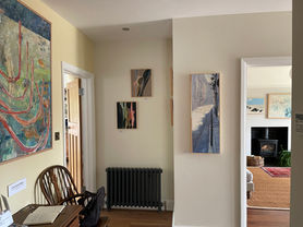 Coming out of the study, into the hallway looking into the living room.
