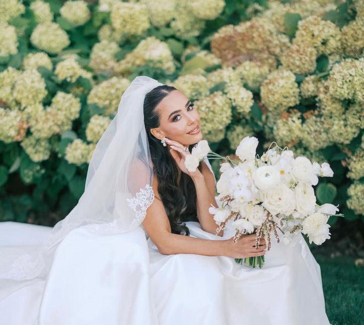Elegant updo bridal hairstyle by JW Artistry, Boston area
