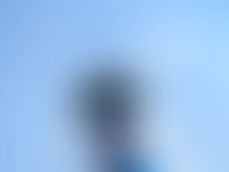 A white robot with blue glowing eyes and colorful wave pattern says "HELLO 2026" in a speech bubble. Background is light blue.