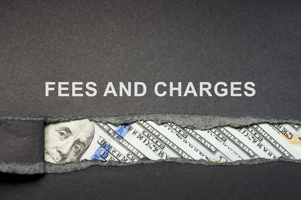 Torn paper reveals dollar bills beneath the words "FEES AND CHARGES" on a dark gray background, suggesting hidden financial costs.