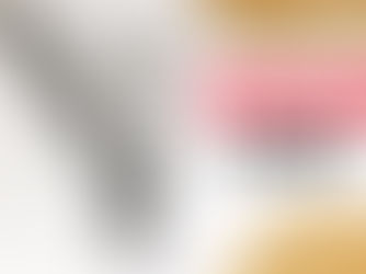 A spiral notebook with "WALMART EFFECT" in bold red and black text lies on a wooden surface, next to a black pen and geometric sheet.