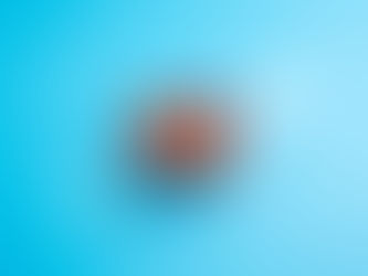 Red basket with two orange boxes on a blue background with a white rising arrow, symbolizing growth or progress.