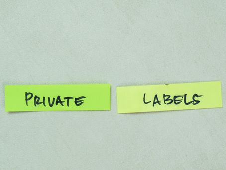 Two yellow sticky notes on a light surface. Left note reads "PRIVATE," right reads "LABELS," both in bold black letters.