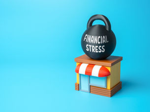 Small shop with a red and white awning under a black weight labeled "Financial Stress," set against a bright blue background.