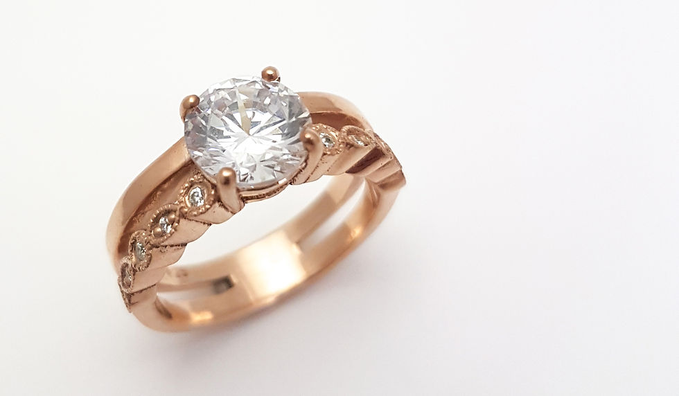 W05 Rose gold diamond ring with vintage style band.