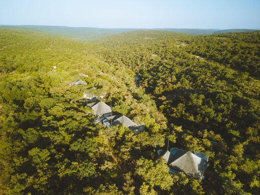 Aerial view over the green, wooded valleys of the Waterberg Biosphere Reserve near Laluka.