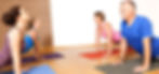An image of some people doing yoga exerc