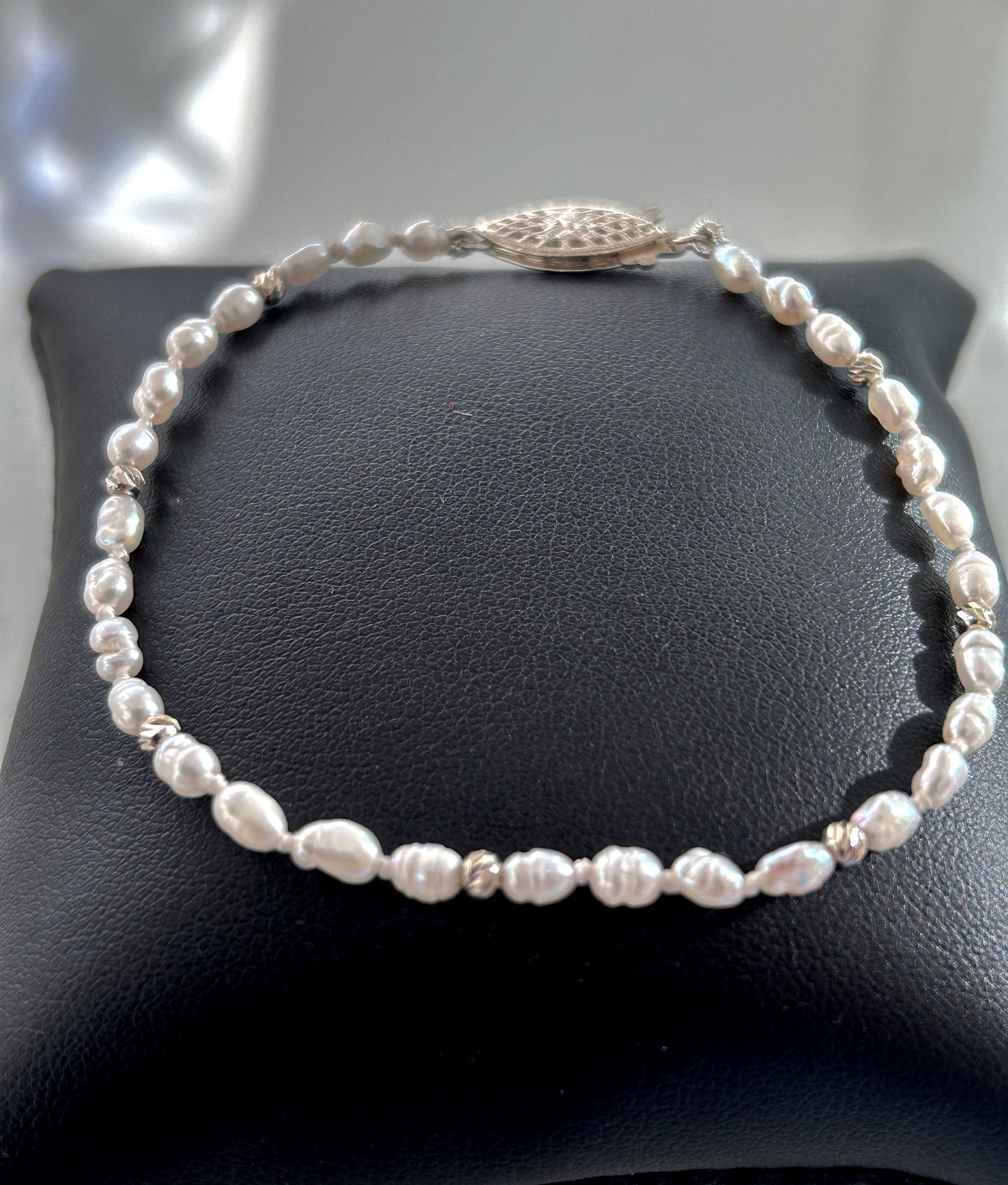 Real Freshwater White Pearls Bracelet In Sterling Silver. modern and unique look add to this traditional pearls bracelet.