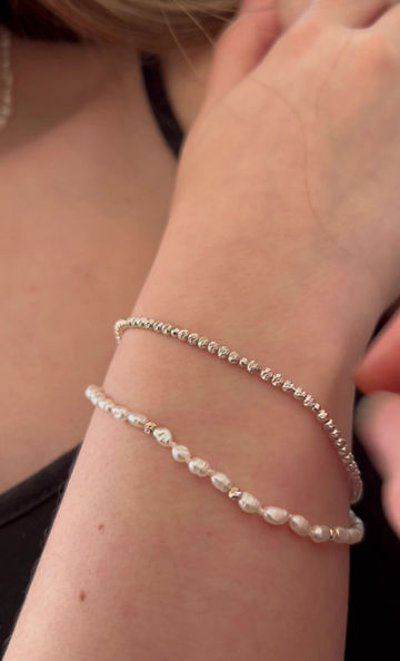 Thumbnail: Real Freshwater White Pearls Bracelet In Sterling Silver. modern and unique look add to this traditional pearls bracelet.