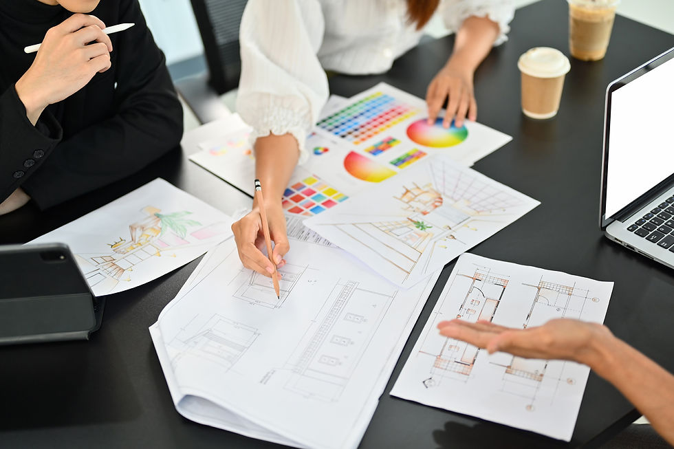 Team reviewing project plans and charts