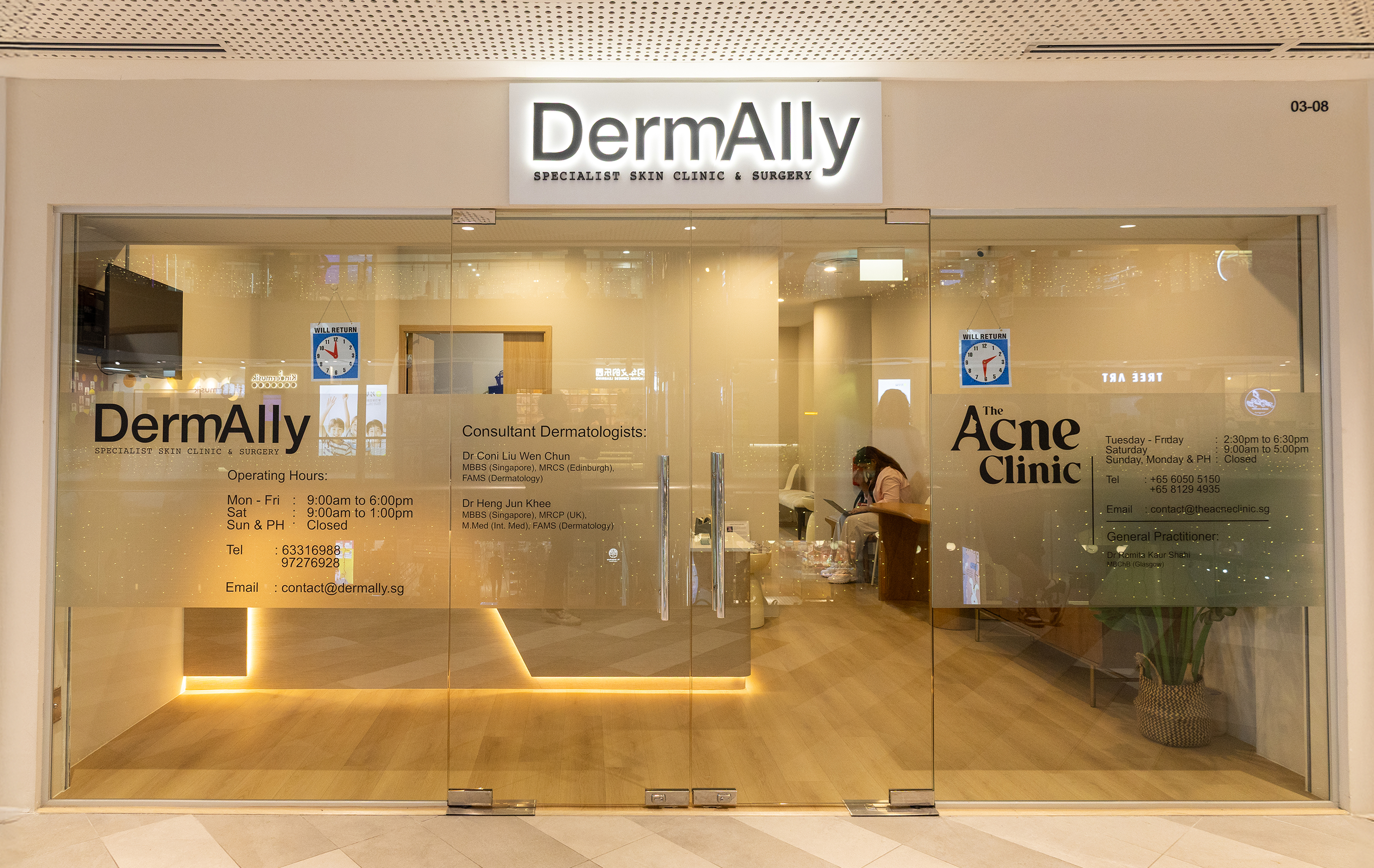 Front entrance of The Acne Clinic in i12 Katong Singapore showing the clinic facade and reception area.