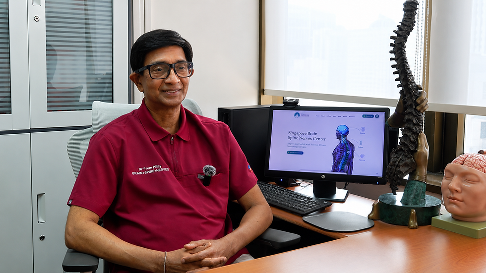 Dr Prem Pillay, Senior Consultant Neurosurgeon at Singapore Brain Spine Nerves Centre, discussing brain, spine and nerve health during clinic interview.
